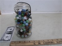 Atlas Glass Jar w/ Lid full of Marbles