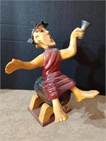 Happy toga wearing Romer hand carved wooden