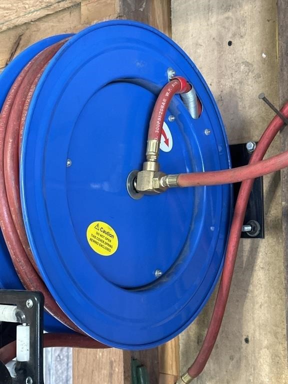 Hose Reel with hose. Like new condition