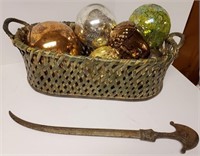 Basket, glass balls, sword decoration