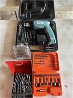 Cordless drill, driver bits, and drill bits.