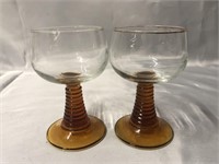 PAIR OF VINTAGE AMBER STEMWARE WINE GOBLETS.