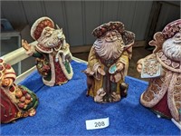 (4) Santa Figurines