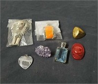 Group of pendants and two buttons
