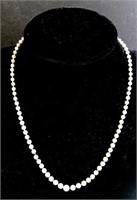Exceptional Single Strand Graduated White Pearl