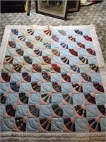 Hand stitched fan quilt