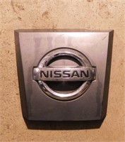 Plastic Nissan emblem