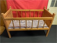 Toy wooden doll bed
