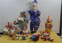 Assorted clown dolls.