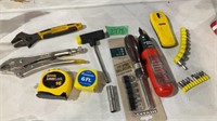 Assorted tools, tape measure, stud finder,