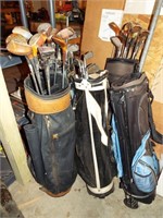 5 Golf Club Bags with Assorted Clubs