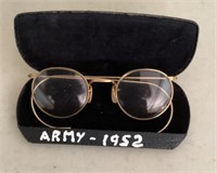 Vintage gold rimmed spectacles in case