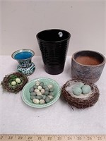 Group of decorative vases and birds nest