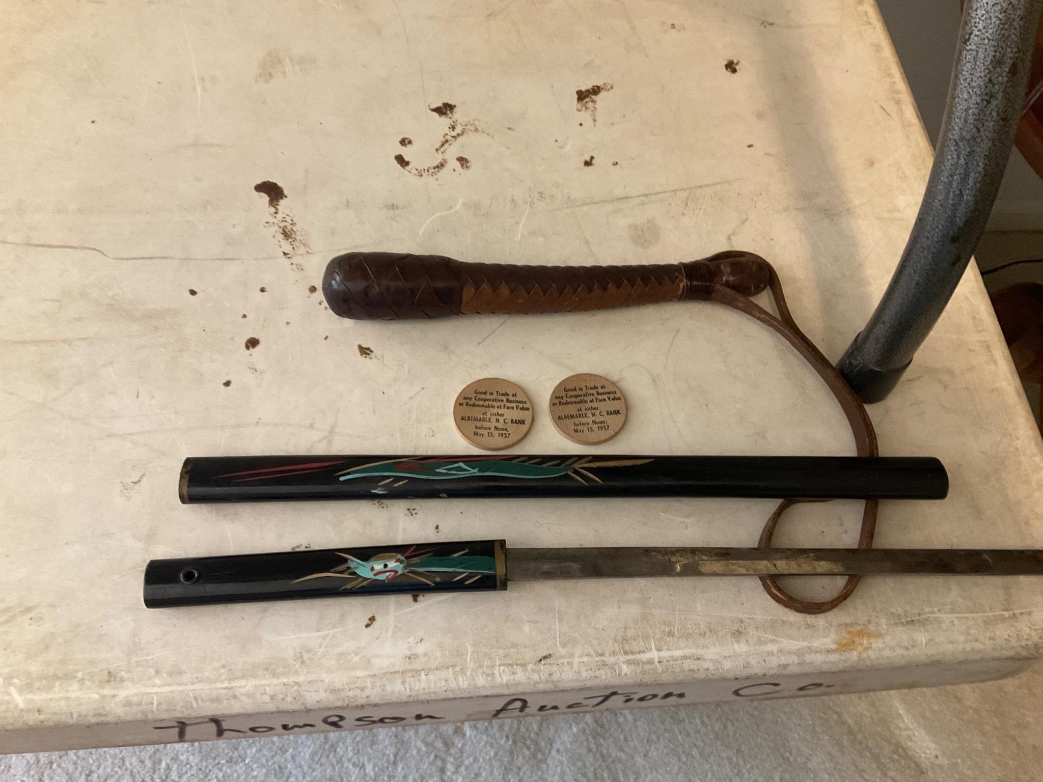 Sword ,baton and wooden nickels Albemarle 1957