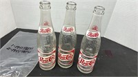 3, 1950's Pepsi Cola Bottles.