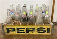 Wooden Pepsi crate with bottles