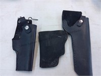 Three miscellaneous leather holsters