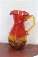 A Vintage Cranberry Crackle Glass Pitcher