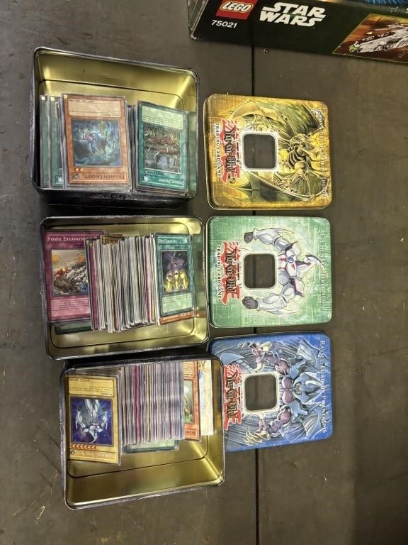 yu-gi -oh 3 tins full of cards