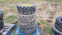 (4) Used 10x16.5 Skidsteer Tires and Rims