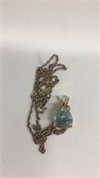 14kt yellow gold chain with Aquamarine pendant