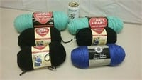 Six Skeins Of Yarn Including Red Heart