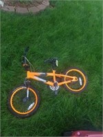 Small orange mongoose mutant bike
