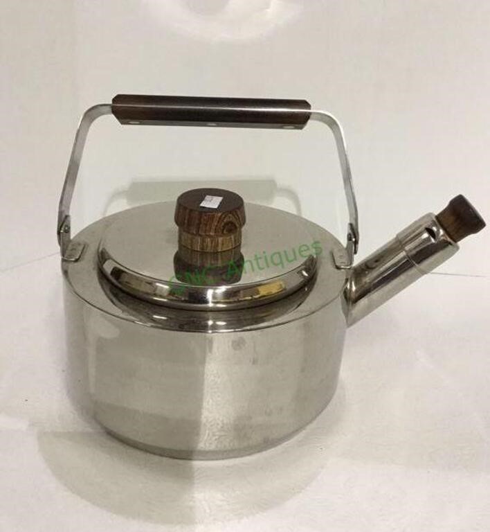 Farber Ware stainless steel 4 quart tea kettle.