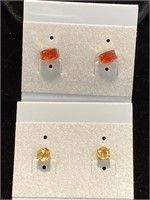 Four pair of stud Pierced Earrings. Different