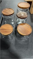5 GLASS CANISTERS W/ WOOD LIDS