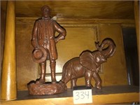 Red Mill man and elephant figures