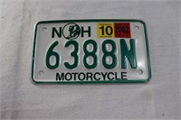 White NH motorcycle license plate