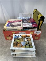 Large assortment of labels, wildlife books,