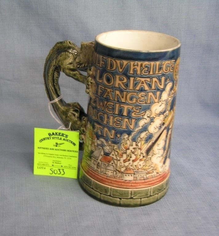 Early German beer stein with dragon handle