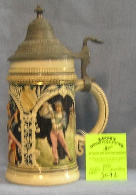 Vintage German beer stein with pewter lid