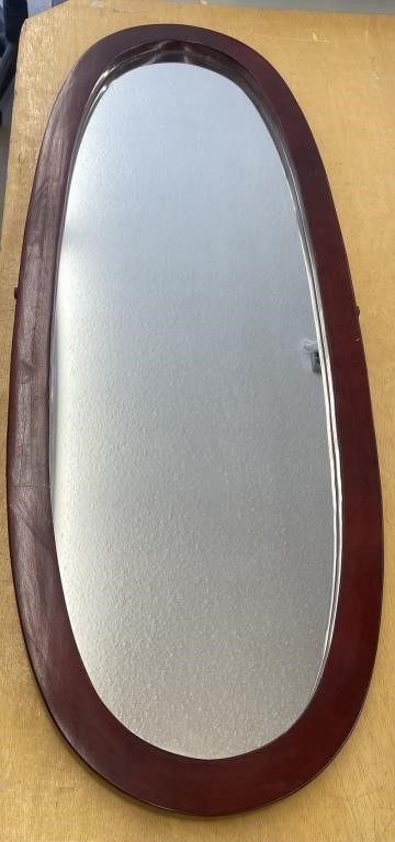 Wooden oval dresser mirror. Approx. 16.75” x