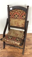 Antique child’s folding chair with original