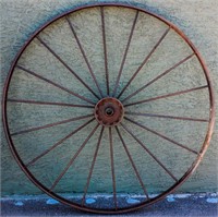 One Vintage Wrought Iron Wheel