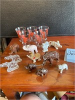 elephant statues and shot glasses