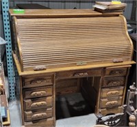 Oak S-Curve roll top desk. Double bank of