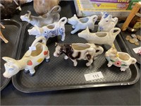 Vintage novelty cow creamers.