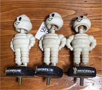 Three Michelin Man Display Bobbleheads