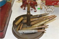 Brass ashtray and bullets