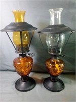 Two Black and Amber Including Hurricane Chimney
