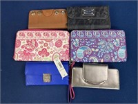 Billfolds and purse/wristlets including Nine