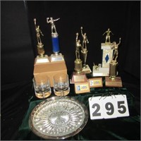 Group eight sports’ trophies.