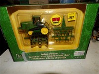 J.D. 1/64th Tractor & Implement set