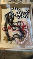 Box of vintage necklaces