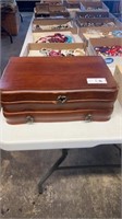 Vintage wooden jewelry box with some jewelry