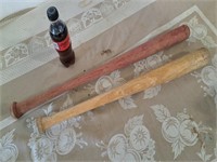 2 wooden children's baseball bats